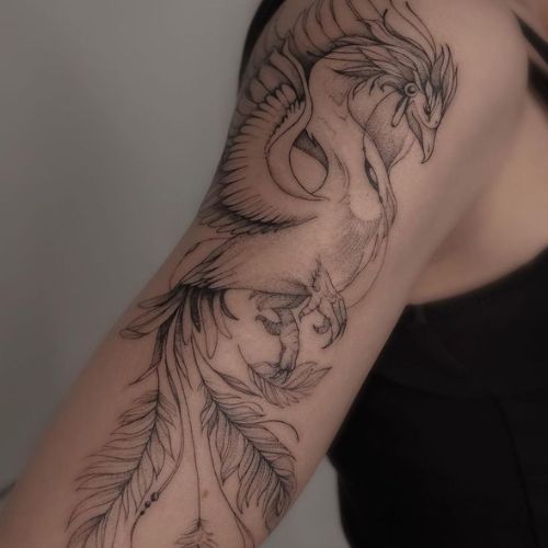 women phoenix tattoo arm