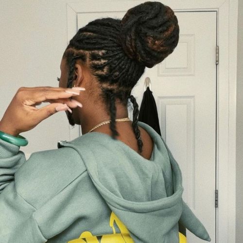 dreadlock hairstyles high bun