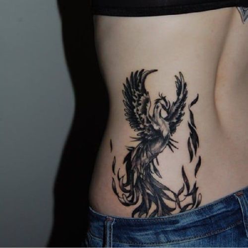 phoenix tattoo lower back women